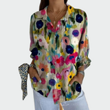 Camisa elegante con estampado floral