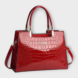 Deolinda | Bolso de mano con patrón brillante de cocodrilo
