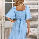 Claire | Vestido midi azul claro de verano con cinturón envolvente