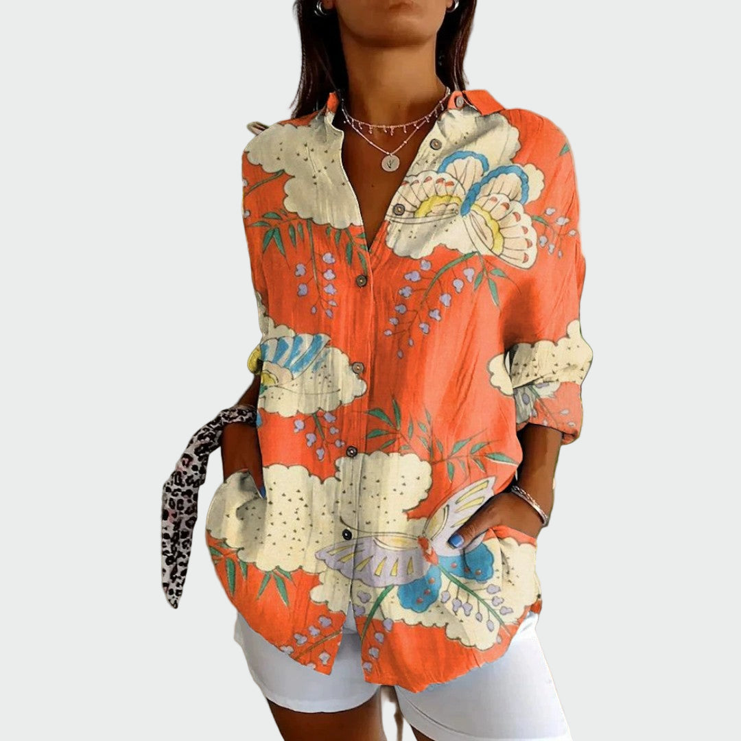 Camisa elegante con estampado floral