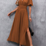 Eterna | Vestido Largo Elegante en Negro con Escote en V Manga Transparente y Abertura