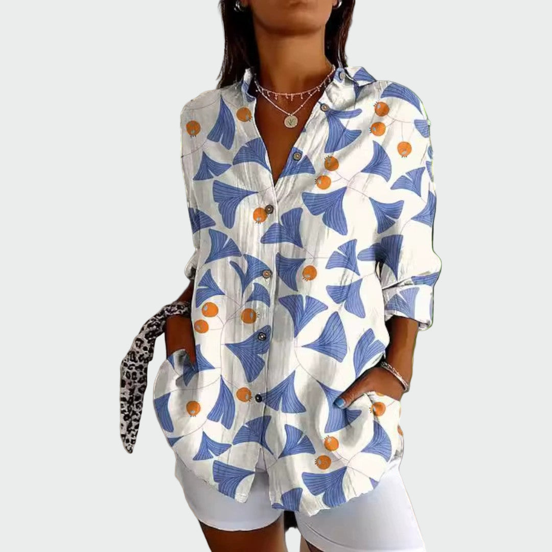 Camisa elegante con estampado floral
